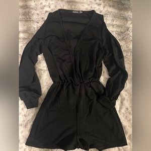 Gently worn open sleeve black romper